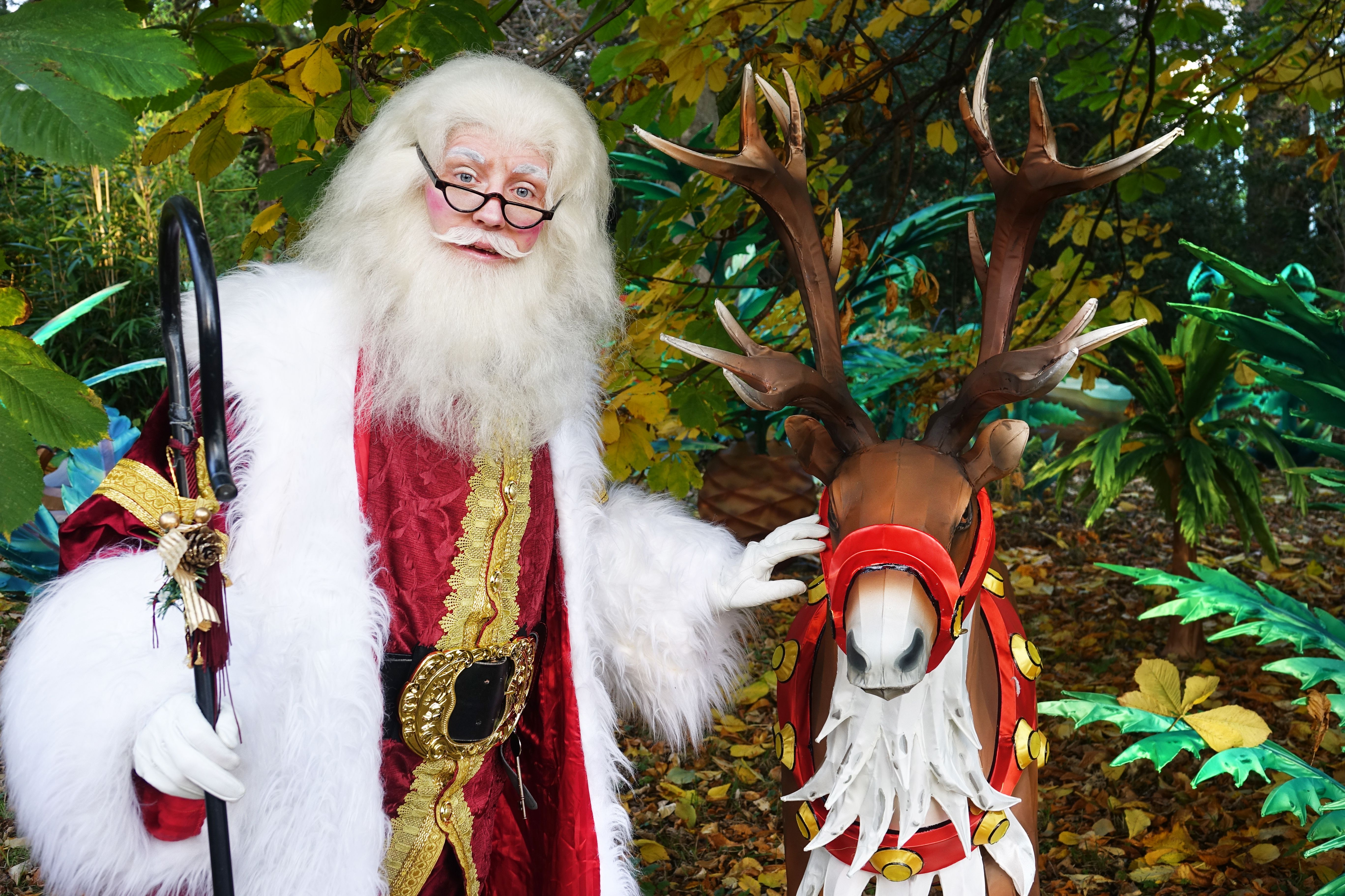 santa claus and a reindeer lantern