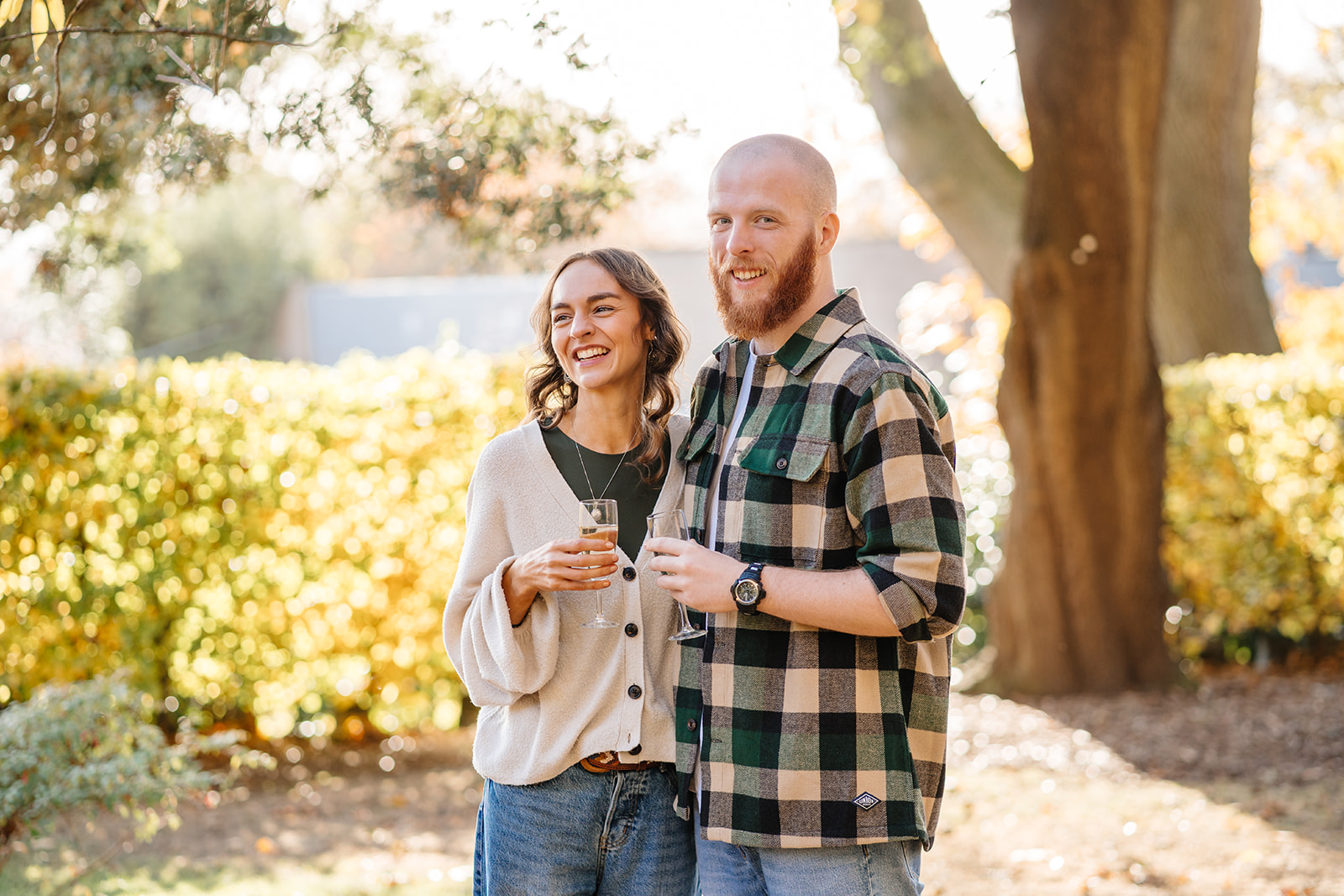 Couple enjoying fizz outside Mansion House as part of the proposal package. IMAGE: Rachel Hein, November 2025