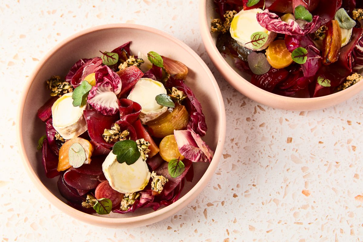 Hand holding coffee mug on bench IMAGE: Robin Mair 2022