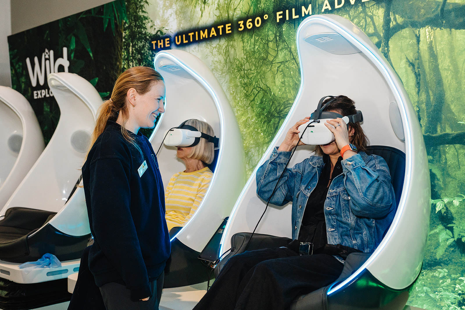 Visitor putting VR headset on. IMAGE: Rachel Hein May 2025