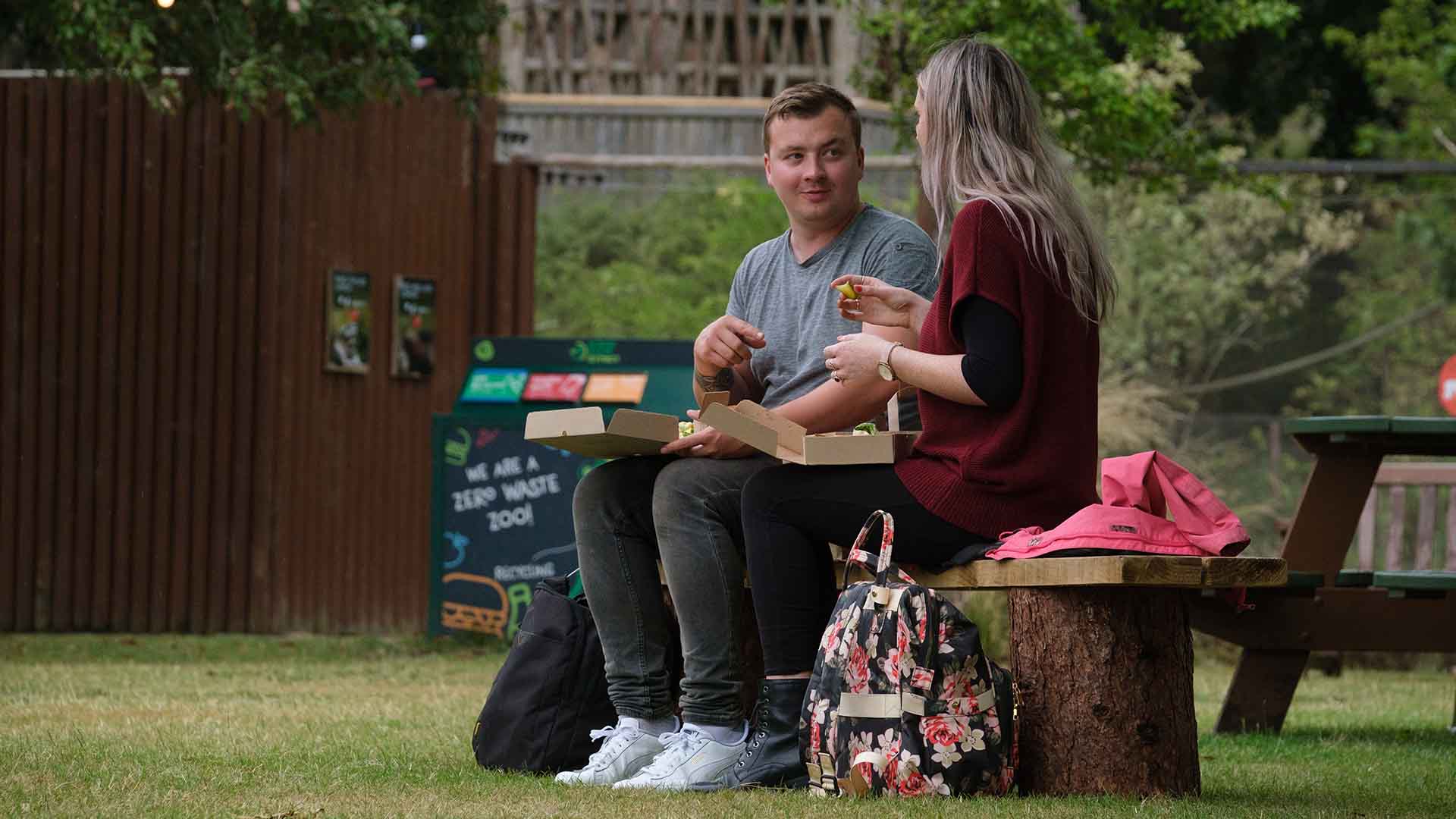 Couple enjoy picnic outside IMAGE: Robin Mair 2022