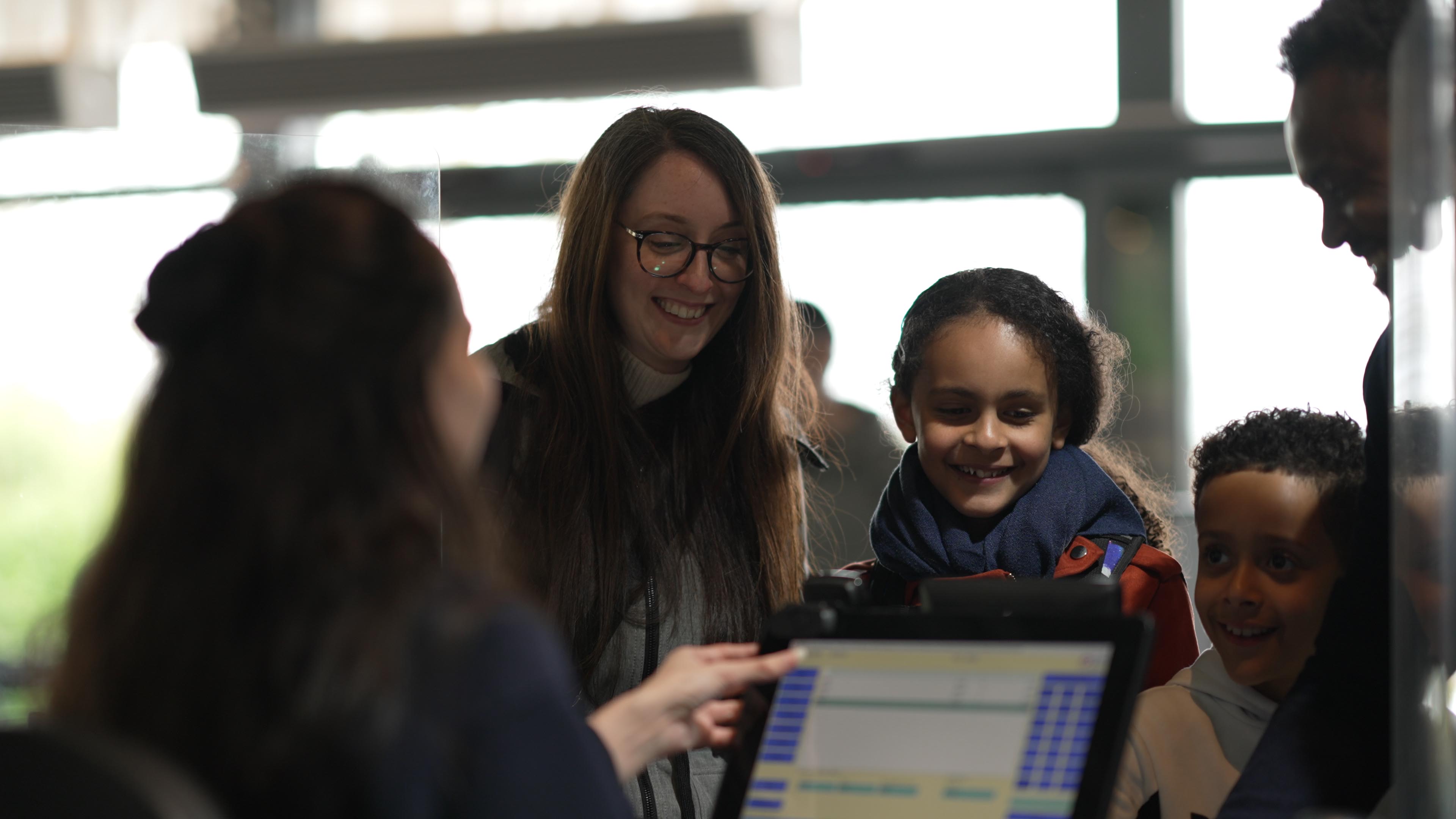 Family at admissions desk IMAGE: FoSho 2022