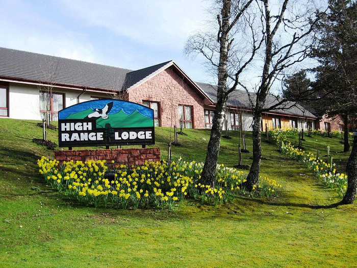 high range lodge aviemore with sign