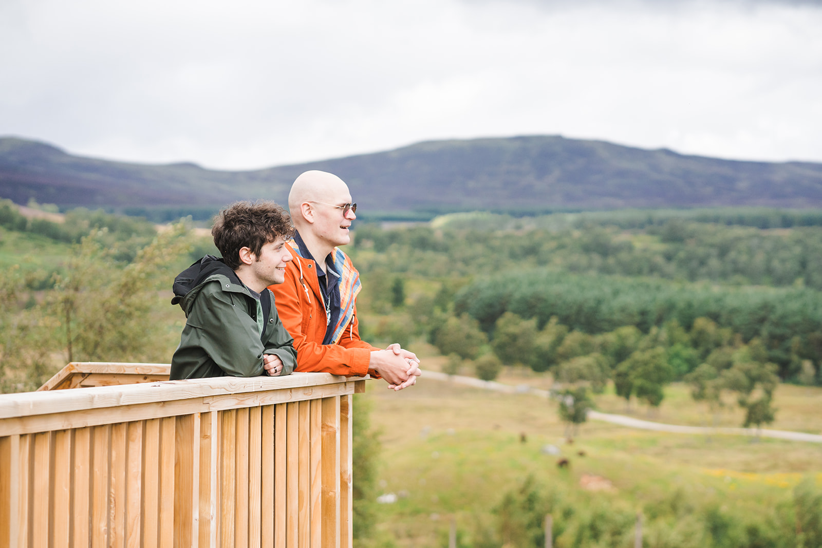 Two men enjoying the view over Highland Wildlife Park IMAGE: Rachel Hein 2024