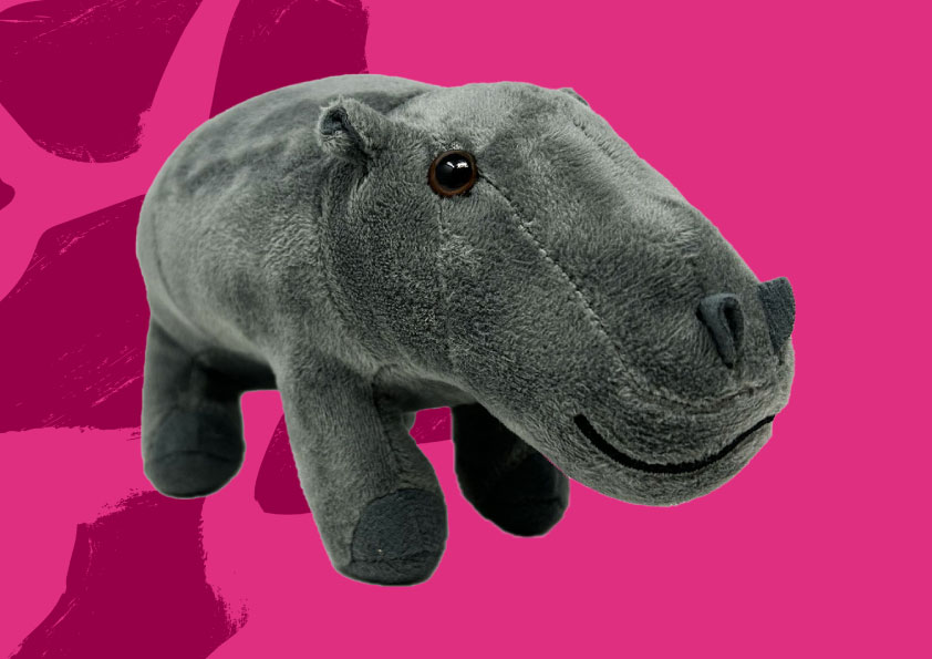 hippo soft toy on pink background with pattern