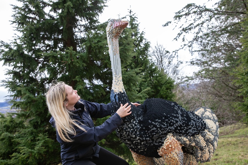 RZSS staff member with brick sculpture IMAGE Laura Moore 2026