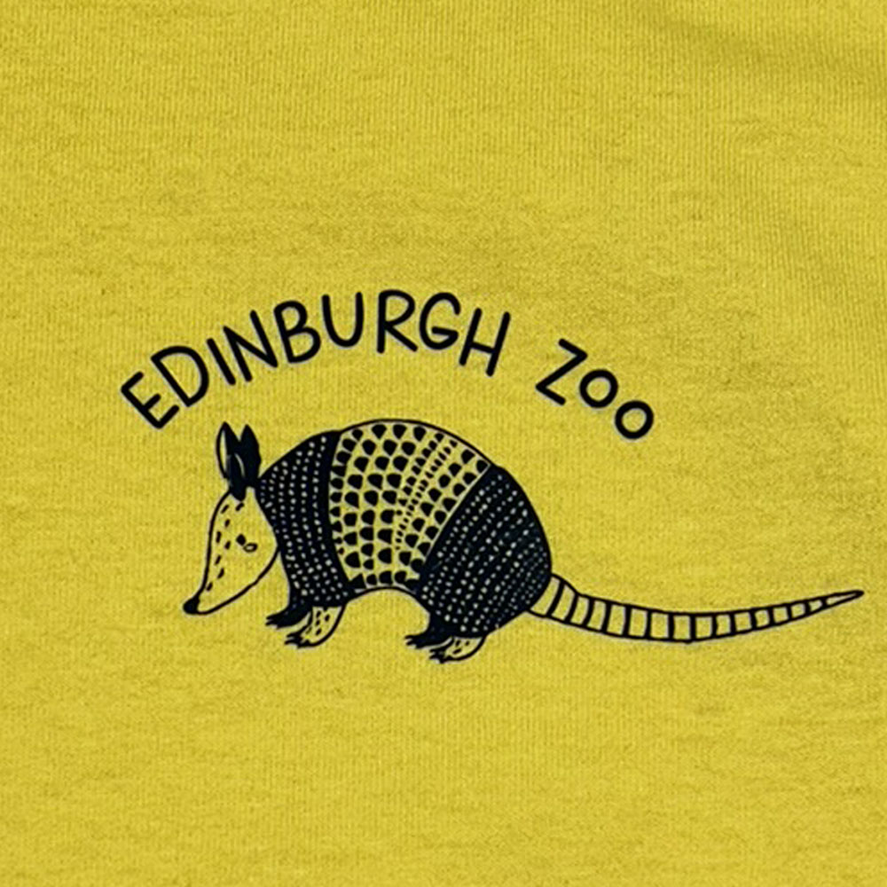 yellow tshirt with navy armadillo and edinburgh zoo writing IMAGE: Retail 2024