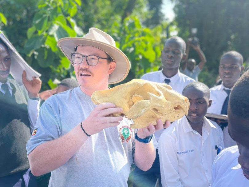 Stuart Owen in Uganda holding a biofact IMAGE RZSS 2026